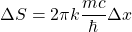 \Delta S=2\pi k\dfrac{mc}{\hbar}\Delta x